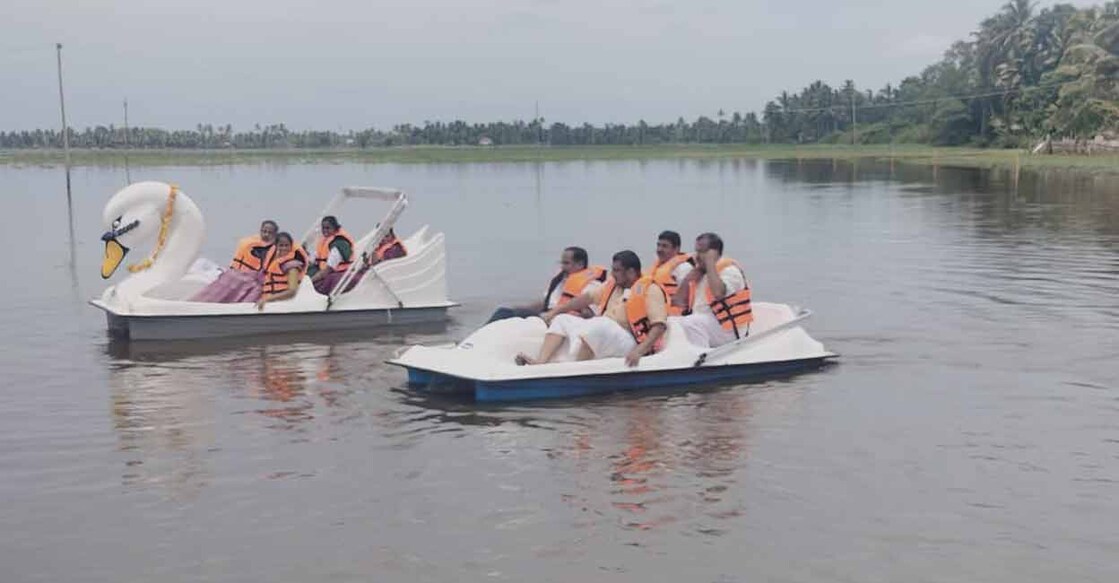 Tourists enjoy boating in Muttar paddy fields. Photo: Special Arrangement