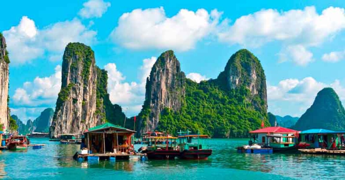 Floating village and rock islands in Halong Bay, Vietnam, Southeast Asia