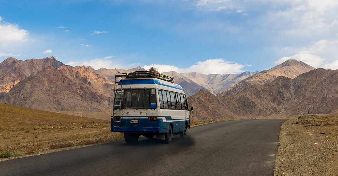 Travelling by buses save travellers from the hassles of parking, paying tolls, and the stress of driving long distances, among others. Photo: Shutterstock/ Thanipat Peeramatukorn