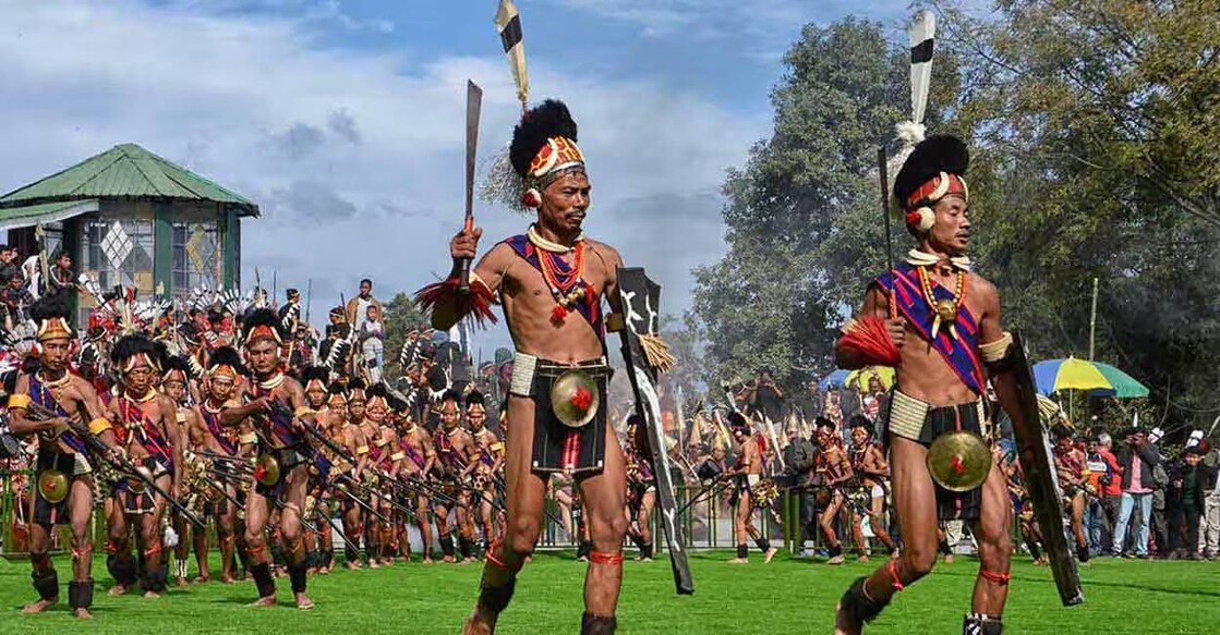 The festival includes a variety of events including 'hornbill naga wrestling,' 'Naga King Chilly and pineapple eating' competitions, handshake concerts, mountain biking, rock contests, Dzukou valley day hikes, and more. Photo: Shutterstock/Anita in travel