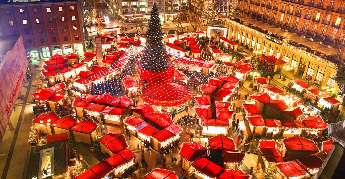 The snow covered streets that are decorated with Christmas illuminations light up the spirit of the visitors too. Photo: Shutterstock/picturetom