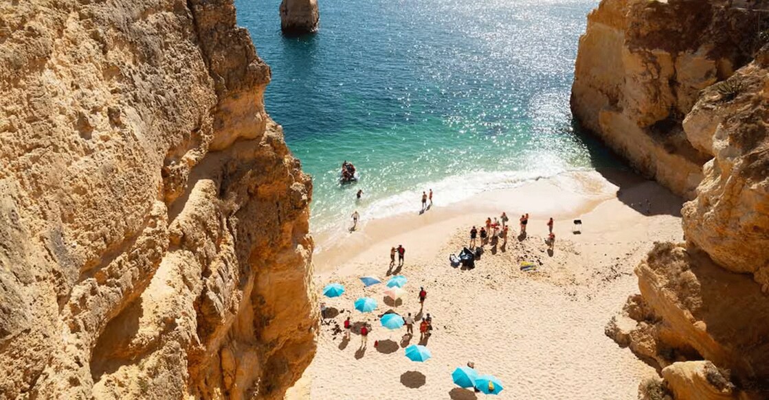Tourists roaming around the city wearing swimwear or skimpy outfits are common in Albufeira. Photo: iStock/kamisoka
