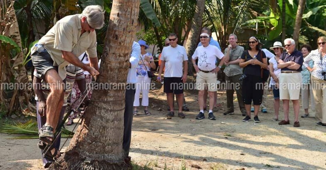 American tourists tap toddy, mat palm leaves at Kumarakom