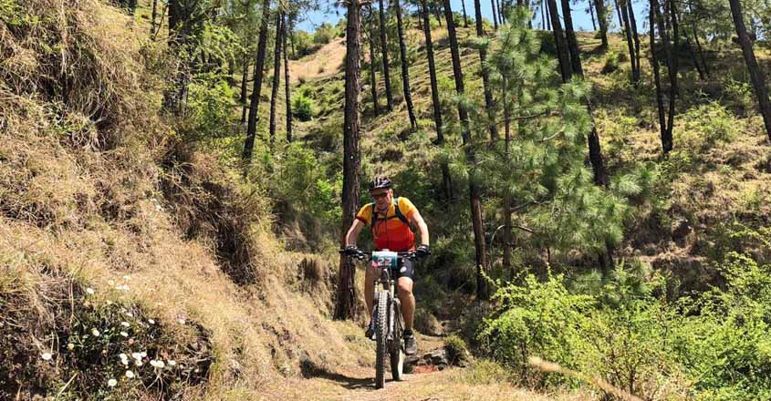 Shimla: Cyclist in action as he takes part in 8th edition of Hero MTB Himalaya Shimla 2019, in Shimla, on April 21, 2019. (Photo: IANS) Shimla: Cyclist in action as he takes part in 8th edition of Hero MTB Himalaya Shimla 2019, in Shimla, on April 21, 2019. (Photo: IANS)