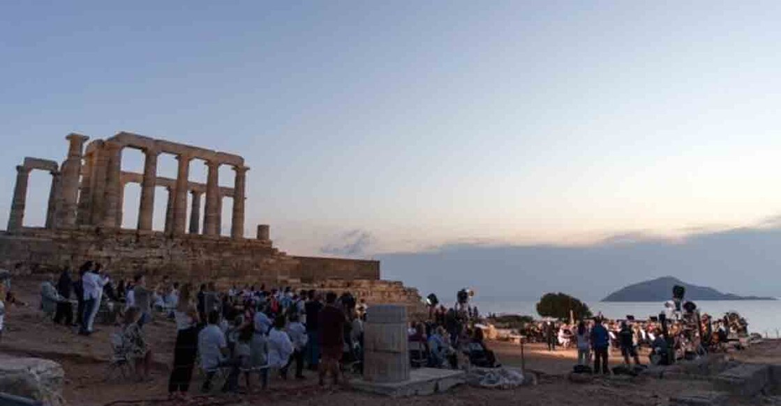 Musicians perform a musical in front of the ruins of the Temple of Poseidon at cape Sounion, some 70 km southeast of Athens, Greece, on Sept. 17, 2020. (Xinhua/Marios Lolos)