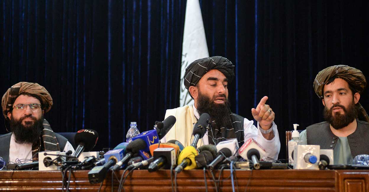 Zabihullah Mujahid Taliban spokesperson Zabihullah Mujahid (C) gestures as he addresses the first press conference in Kabul on August 17, 2021 following the Taliban stunning takeover of Afghanistan. Photo: Hoshang Hashimi / AFP