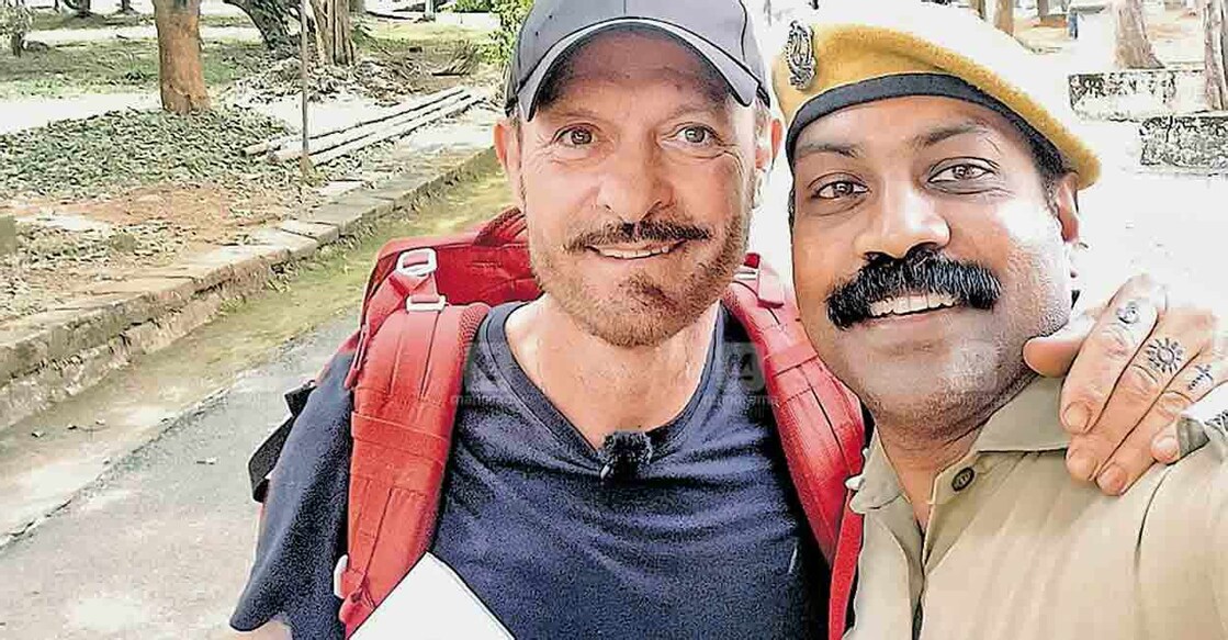 Shabab (R), a security personnel at  the Kerala Kalamandalam in Thrissur, with Salvatore Schillaci 'Toto' (R).
