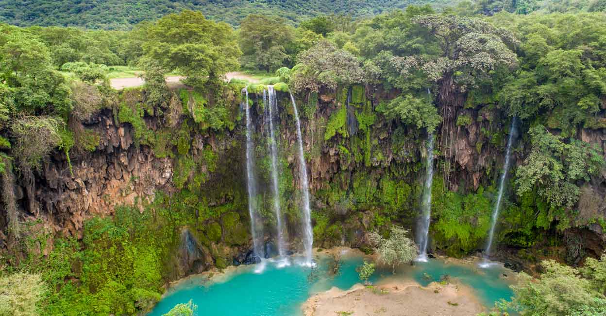 Ayn Athum Waterfall, Salalah, Oman. Photo: Shutterstock/Mahmoud Ghazal
