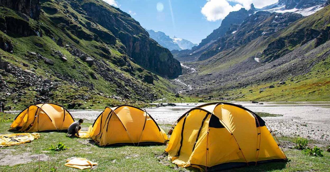 Balu Ka Ghera campsite, a popular campsite at Hampta Pass Trek, Manali. Photo: Shutterstock/sumankyal