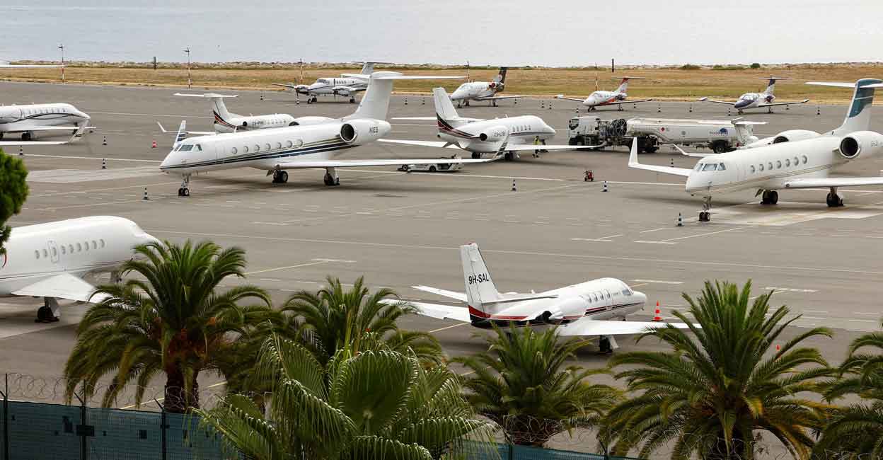 As portfolios grow, so does the demand for experiences – from staying in high-end tents in wildlife reserves in Africa, to viewing world famous art, without the crowds. In the picture, private jets are seen on the tarmac of Nice international airport, France. Photo: Reuters/Eric Gaillard
