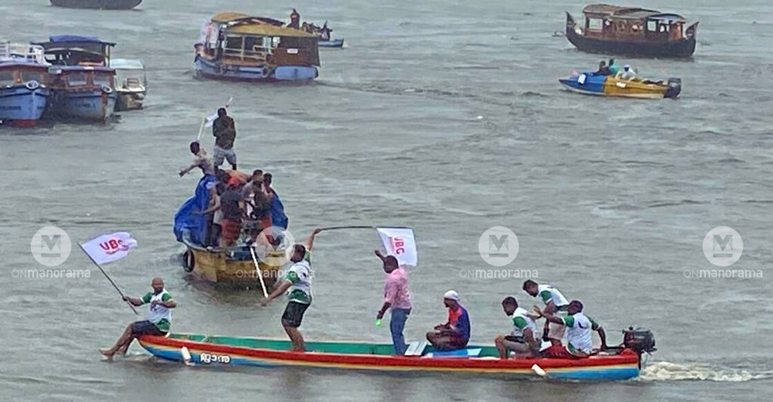 Fans of Pallathuruthy Boat Club celebrate their team's success in Punnamada, Alappuzha on Saturday.