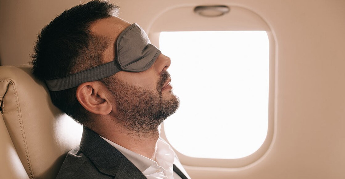 The EY cabin lighting of the plane remains bright throughout the flight and the airline is hoping to help passengers handle the discomfort with eye masks.  Photo: Shutterstock/LightField Studios