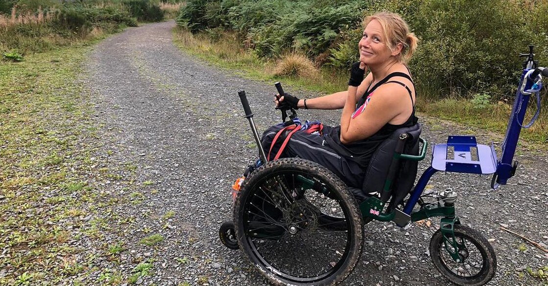 Karen, who was a geologist, was left paralyzed chest down following an accident while scaling a sea cliff in 1993. Photo: Instagram/handbikedarke