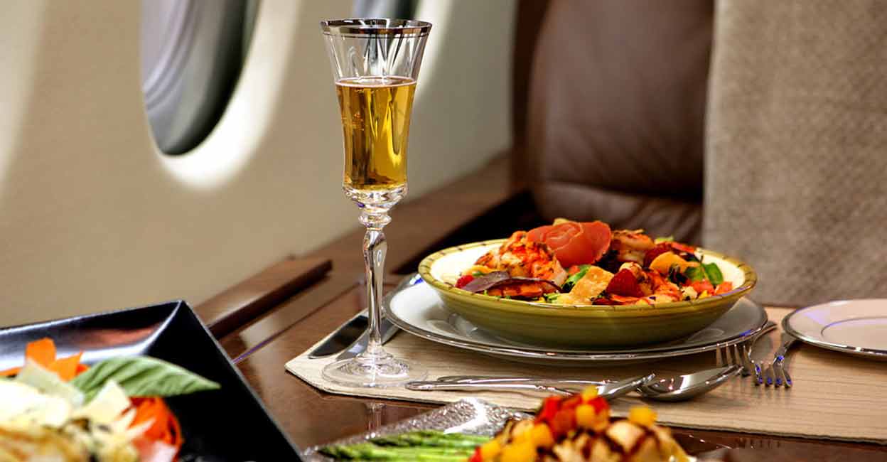 alcohol-flight The packaging or the seal of the alcohol bottle shouldn’t be opened as the passengers are not allowed to consume their alcohol on flights. Photo: iStock/GTNoffsinger