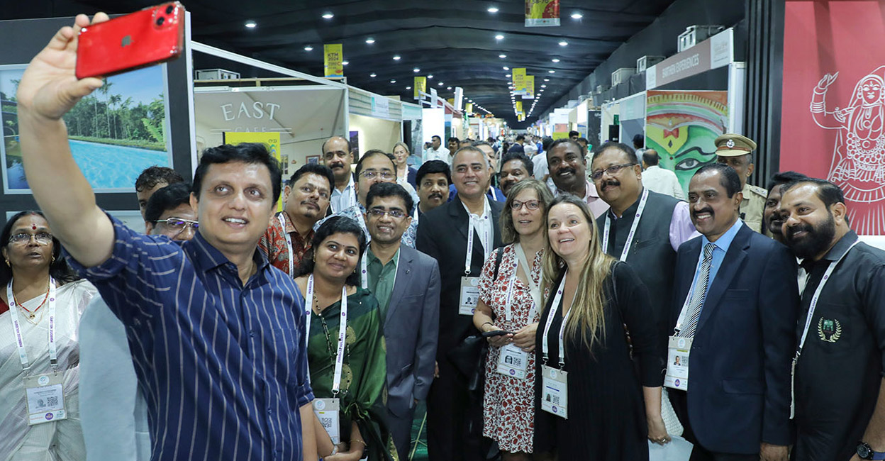Kerala Tourism Minister P A Mohamed Riyas with the foreign tourist agents at the Kerala Travel Mart. Photo: Special Arrangement