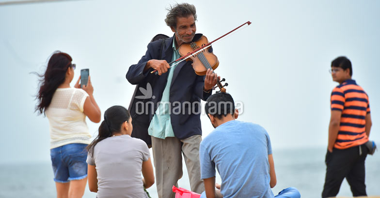You may have met this old man at Kollam beach You may have met this old man at Kollam beach
