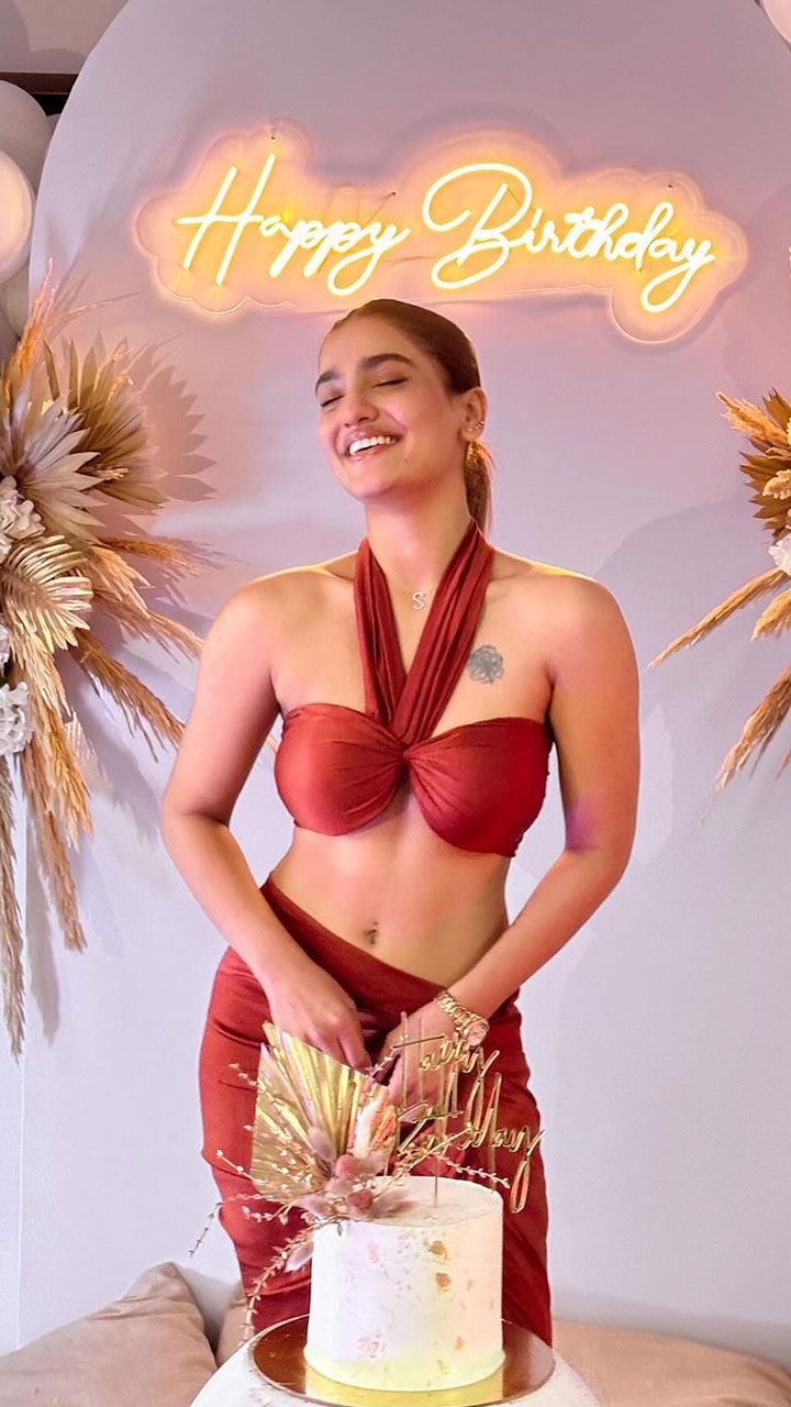 Saniya Iyappan's beach-themed birthday party and attire went viral on social media. She rocked the satin red-coloured bikini dress on her 22nd birthday and oozed confidence, though some were quick to pass judgements on her choice of dressing.