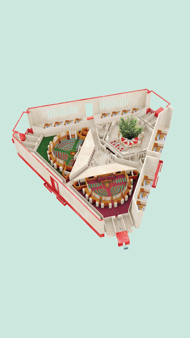 The building is triangular-shaped and is located adjacent to the Old Parliament, on Plot number 118 between Red Cross Road and Raisina Road in Delhi.