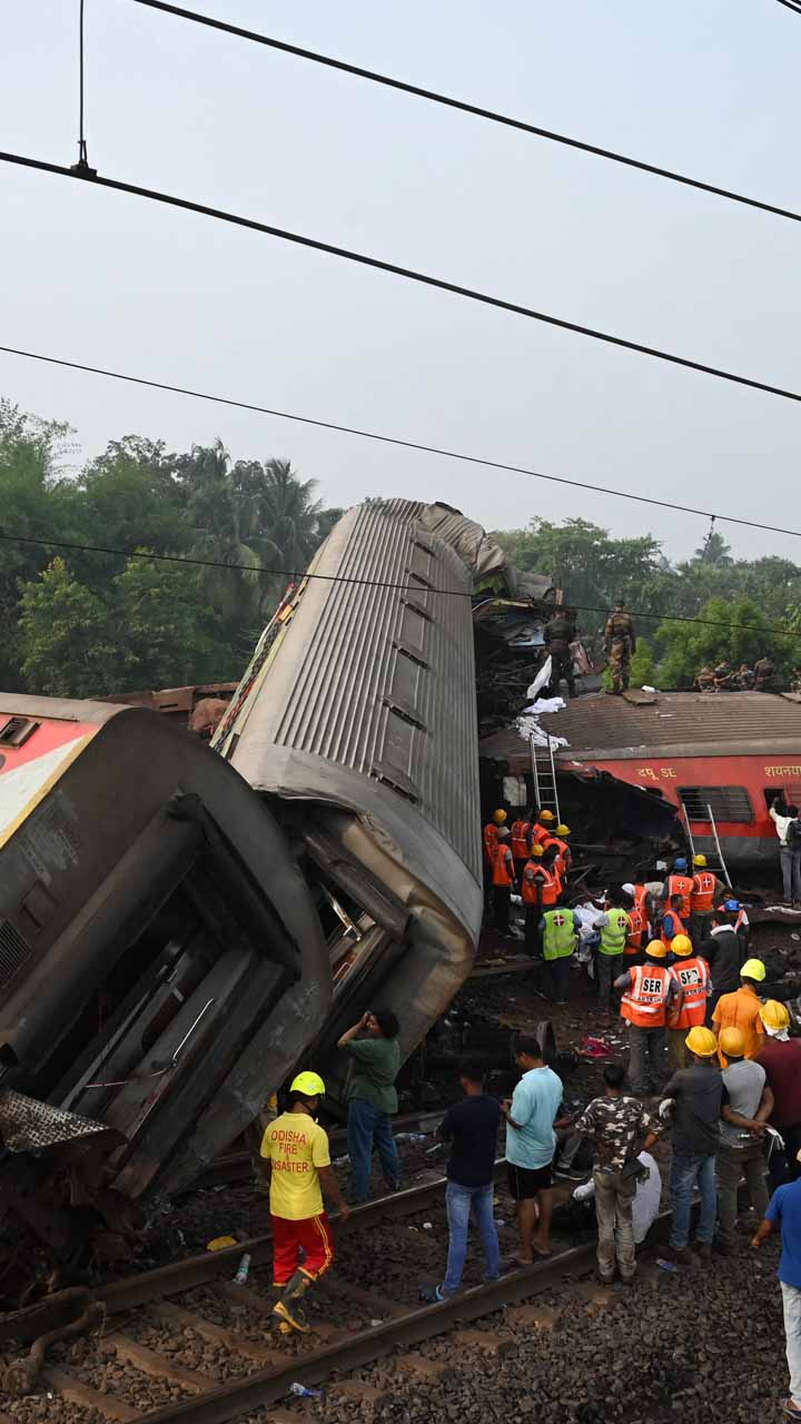 Some coaches of the Shalimar-Chennai Express fell on top of a stationary goods train on an adjacent track.