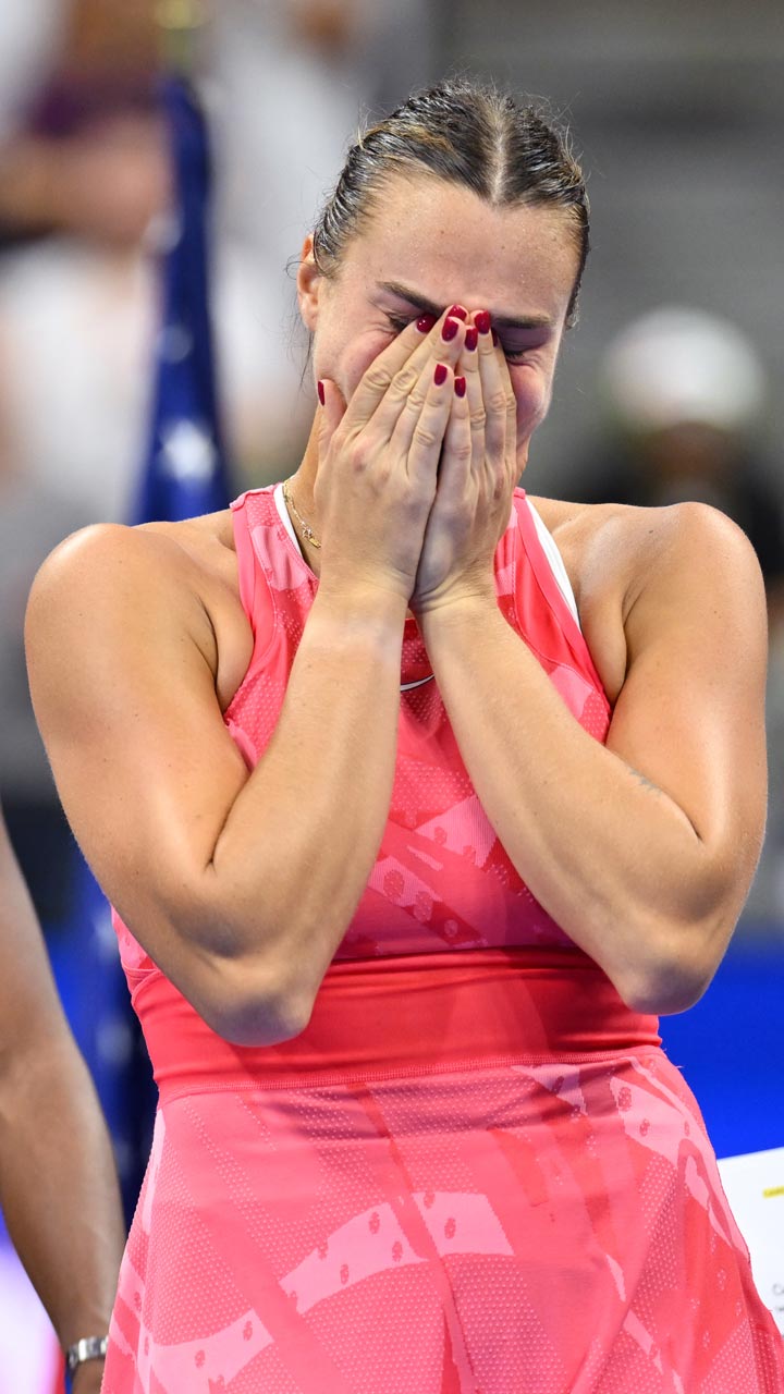 Aryna Sabalenka breaks down during the presentation ceremony. Photo: AFP/Angela Weiss