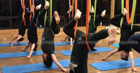 Try Aerial Yoga if you are looking for a new, fun and challenging full body exercise