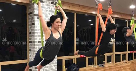 Try Aerial Yoga if you are looking for a new, fun and challenging full body exercise