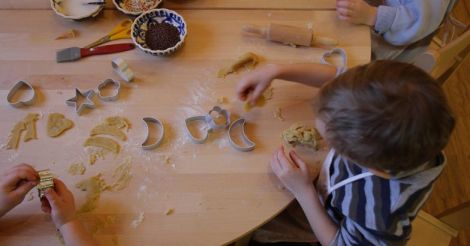 Kids cutting cookies