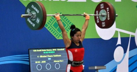 Guwahati: Indian weightlifter Mirabai Chanu Saikhom in action and win the gold medal in the women`s weightlifting, at 12th South Asian Games, in Guwahati on Feb. 6, 2016. (Photo: IANS/PIB), This petite woman from Manipur is the new poster girl of Indian sport 