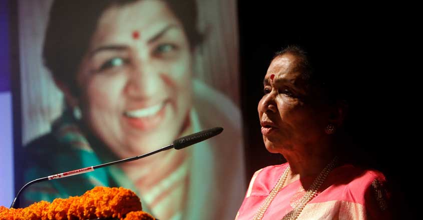 Mumbai: Singer Asha Bhosle addresses at the launch of her sister Meena Mangeshkar-Khadikar's book â  Mothi Tichi Savliâ  , based on the life of Lata Mangeshkar; in Mumbai on Sept 28, 2018. (Photo: IANS)