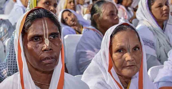 widows Vrindavan: Widows attend the inauguration programme of Krishna Kutir, a home for 1000 widows, in Vrindavan near Mathura on Friday, Aug 31, 2018.